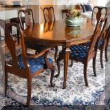 F12. Drexel Heritage dining table with six chairs. 29”h x 68”w (2 leaves, each 22”) 